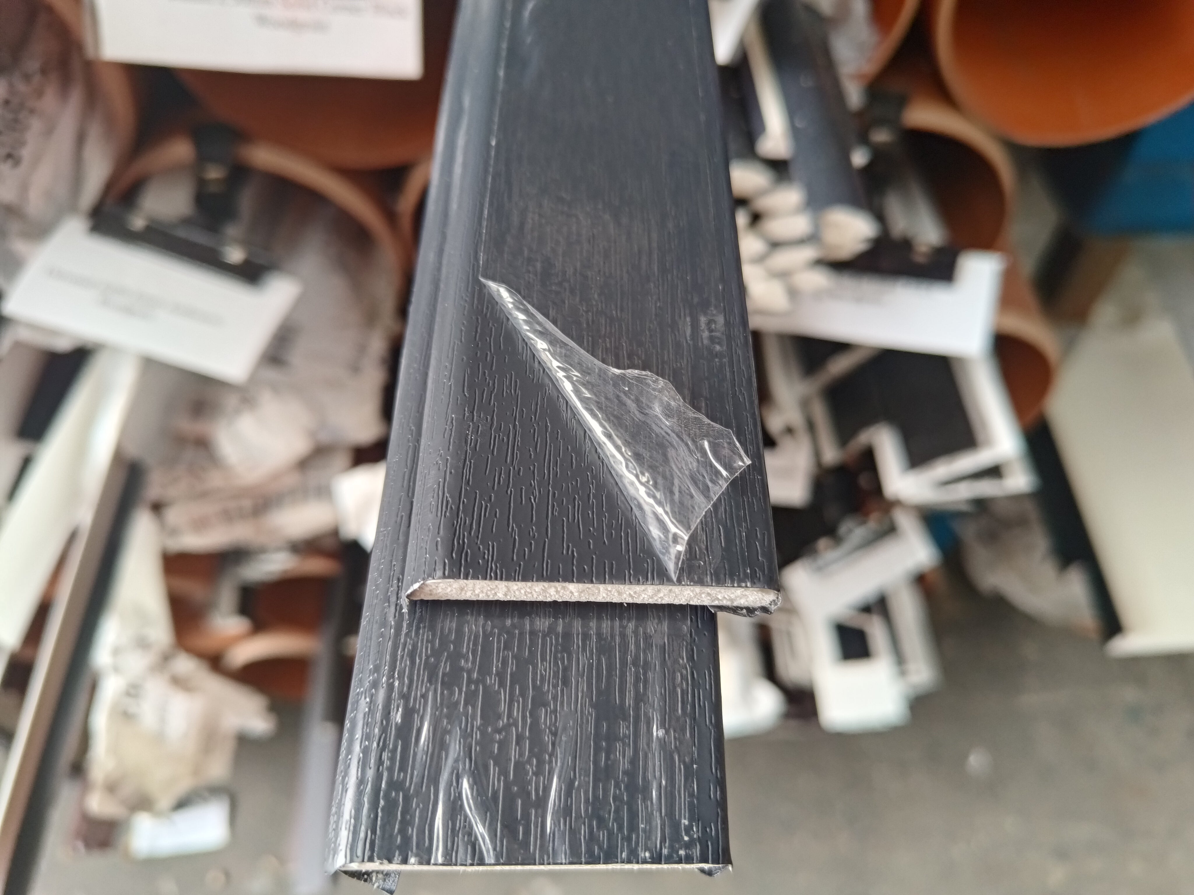 45mm x 6mm Anthracite Woodgrain Foiled UPVC Trim 5mtr Length