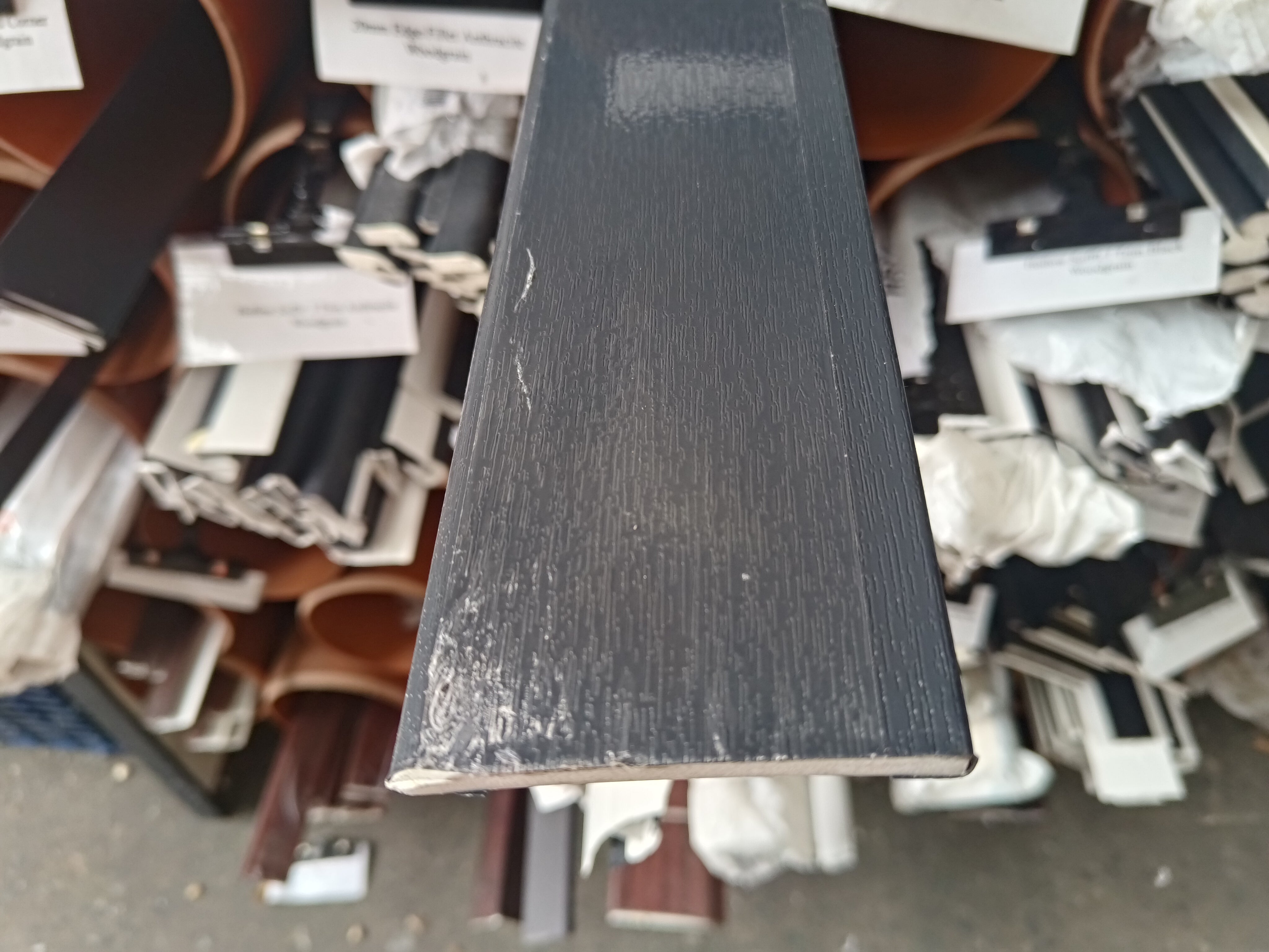 70mm x 6mm Anthracite Woodgrain Foiled UPVC Trim 5mtr Length