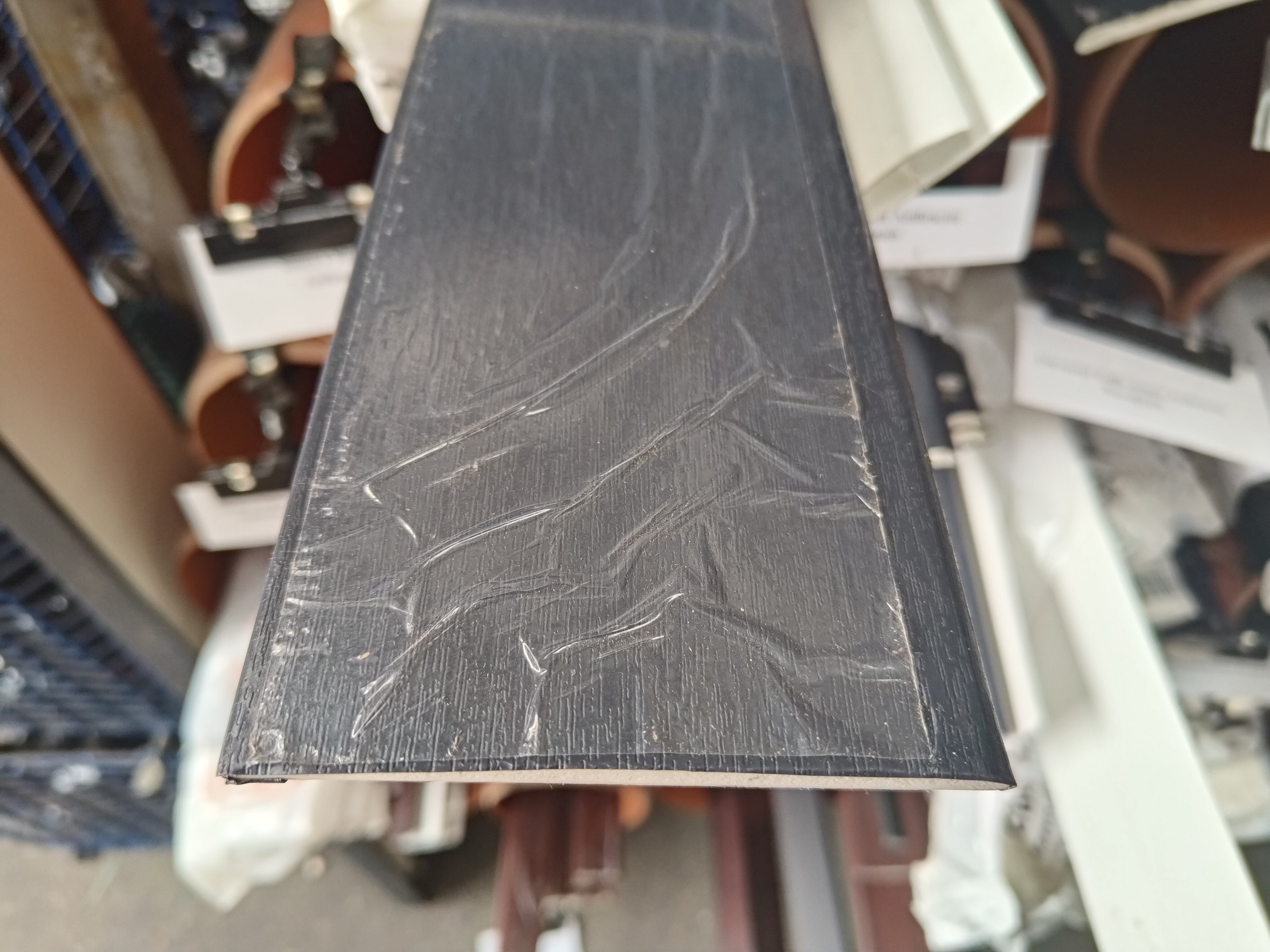 95mm x 6mm Anthracite Woodgrain Foiled UPVC Trim 5mtr Length