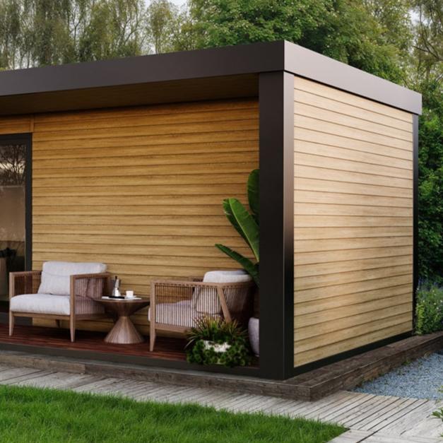 NatureClad ShipLap Cladding In Coastal Sand On A Garden Building